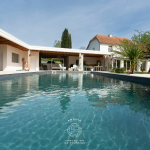 Corps de ferme rénové à Jurançon, 208 m², piscine chauffée, parc d’un hectare